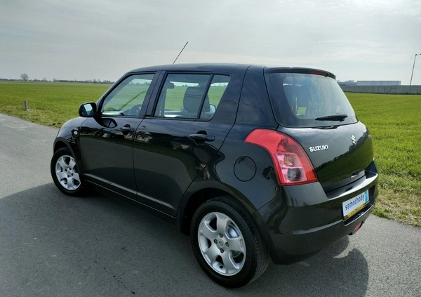 Suzuki Swift cena 13900 przebieg: 170675, rok produkcji 2009 z Zambrów małe 407